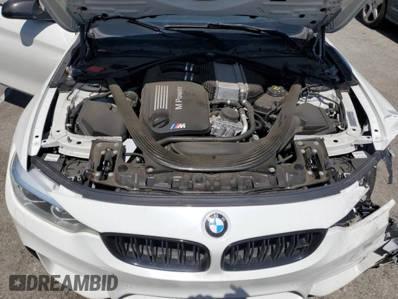 2015 BMW M4 with VIN WBS3R9C51FK334414, listed as a Copart auction lot 52451035 with 122,436 mi miles and Salvage title. Bid and sale history available at DreamBid. Image 11.