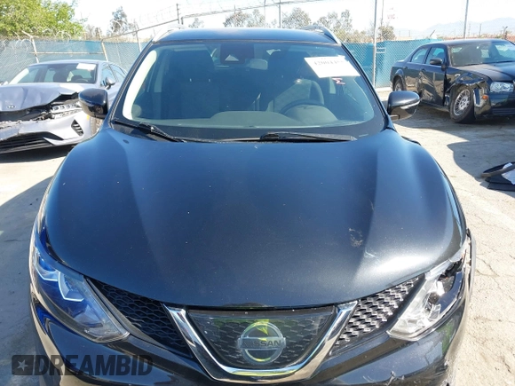 2019 Nissan Rogue Sport S with VIN JN1BJ1CPXKW233049, listed as a IAAI auction lot 42004455 with 63,427 mi miles. Bid and sale history available at carsss.com. Image 12.