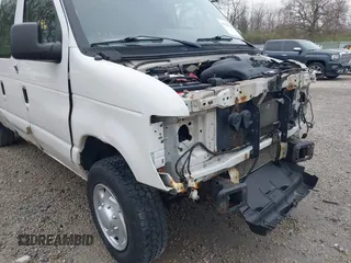 2012 Ford Econoline Cargo Commercial with VIN 1FTNE1EW0CDB10750, listed as a IAAI auction lot 41939696 with 180,042 mi miles. Bid and sale history available at carsss.com. Image 19.
