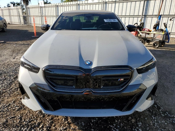 2024 BMW i5 M60 with VIN WBY43FK04RCR21463, listed as a Copart auction lot 76382184 with 2,987 mi miles and Salvage Title. Bid and sale history available at carsss.com. Image 5.