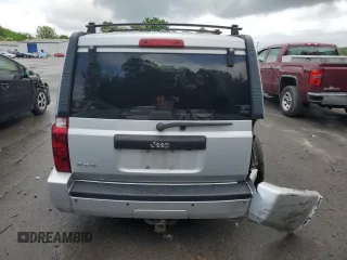 2009 Jeep Commander Sport z VIN 1J8HG48K29C531877, wystawiony jako Copart lot #58708825 z przebiegiem 198 585 mil mil oraz Szkoda całkowita • Salvage title. Historia ofert i sprzedaży dostępna na DreamBid. Obrazek 6.