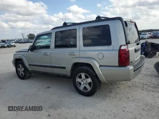 2009 Jeep Commander Sport with VIN 1J8HH48K59C514861, listed as a Copart auction lot 44076015 with 129,674 mi miles and Salvage title. Bid and sale history available at DreamBid. Image 2.