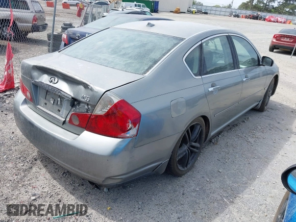 2006 Infiniti M with VIN JNKAY01E96M116823, listed as a IAAI auction lot 42028550 with 256,590 mi miles. Bid and sale history available at carsss.com. Image 4.