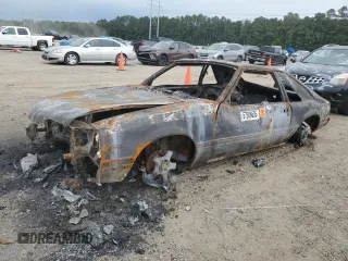 1987 Ford Mustang z VIN 1FABP41A5HF135072, wystawiony jako Copart lot #57586605 z przebiegiem Nie podano mil oraz Szkoda całkowita • Salvage title. Historia ofert i sprzedaży dostępna na DreamBid. Obrazek 1.