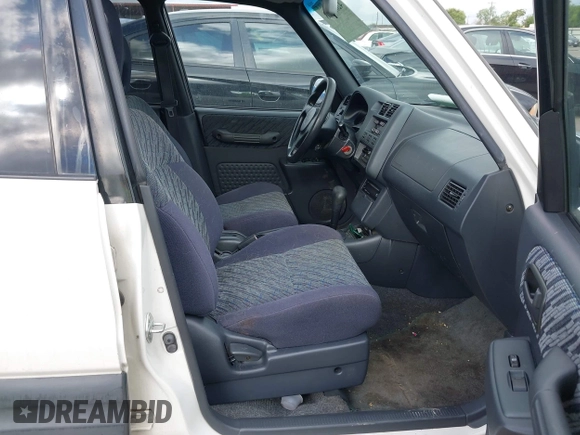 1999 Toyota RAV4 with VIN JT3GP10V2X0037397, listed as a IAAI auction lot 42603598 with 136,207 mi miles and . Bid and sale history available at DreamBid. Image 5.