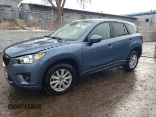 2014 Mazda CX-5 Touring z VIN JM3KE4CY9E0399377, wystawiony jako Copart lot #87865465 z przebiegiem 85 974 mil mil oraz Szkody całkowita. Historia ofert i sprzedaży dostępna na DreamBid. Obrazek 1.