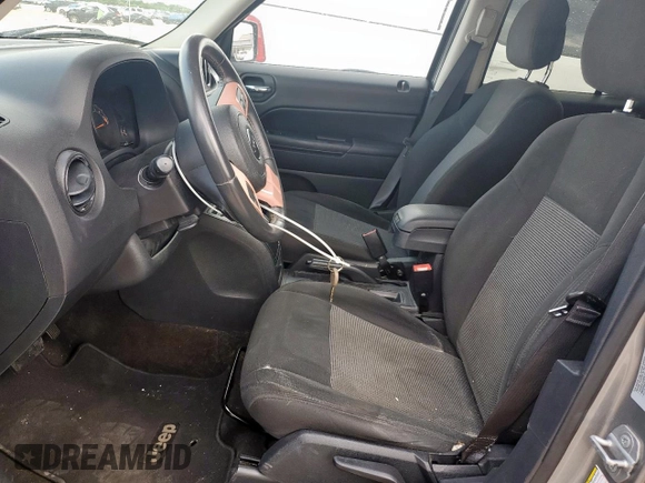 2015 Jeep Patriot Latitude with VIN 1C4NJPFBXFD368160, listed as a Copart auction lot 59235425 with 105,529 mi miles and Salvage title. Bid and sale history available at DreamBid. Image 7.