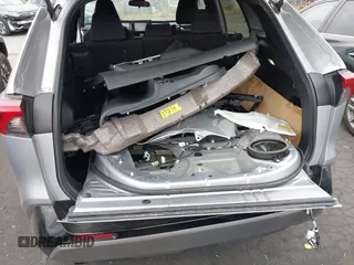 2022 Toyota RAV4 Hybrid SE z VIN 4T3T6RFV9NU070229, wystawiony jako IAAI lot #42565070 z przebiegiem 21 901 mil mil oraz . Historia ofert i sprzedaży dostępna na DreamBid. Obrazek 12.