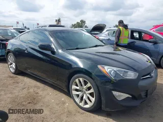 2014 Hyundai Genesis Coupe R-Spec z VIN KMHHT6KD4EU119873, wystawiony jako IAAI lot #38910385 z przebiegiem 127 596 mil mil oraz . Historia ofert i sprzedaży dostępna na DreamBid. Obrazek 1.