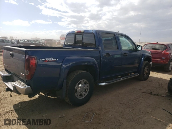 2006 GMC Canyon SLE2 with VIN 1GTDT136968311810, listed as a Copart auction lot 77146164 with 243,109 mi miles and Salvage Title. Bid and sale history available at carsss.com. Image 3.
