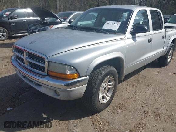 2003 Dodge Dakota SLT with VIN 1D7HL48N83S236590, listed as a IAAI auction lot 41796103 with 221,667 mi miles. Bid and sale history available at carsss.com. Image 2.