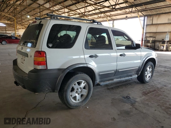 2006 Ford Escape XLT with VIN 1FMYU03166KA73605, listed as a Copart auction lot 71968524 with 143,742 mi miles and Salvage Title. Bid and sale history available at carsss.com. Image 3.