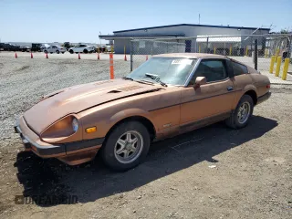 1982 Datsun 280ZX z VIN JN1HZ04S0CX433451, wystawiony jako Copart lot #53912864 z przebiegiem 200 629 mil mil oraz Tytuł czysty. Historia ofert i sprzedaży dostępna na DreamBid. Obrazek 1.