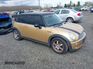 2005 MINI Hardtop with VIN WMWRC33555TK61361, listed as a IAAI auction lot 41940037 with 145,028 mi miles and . Bid and sale history available at DreamBid. Image 1.