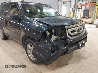 2011 Honda Pilot EX-L with VIN 5FNYF4H52BB038651, listed as a IAAI auction lot 41868695 with 281,683 mi miles. Bid and sale history available at carsss.com. Image 6.