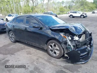 2019 Kia Forte LXS z VIN 3KPF24AD8KE083734, wystawiony jako IAAI lot #41936370 z przebiegiem 89 159 mil mil oraz . Historia ofert i sprzedaży dostępna na DreamBid. Obrazek 1.