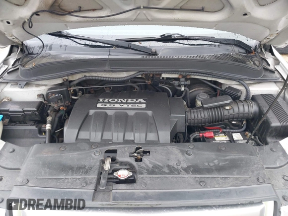 2006 Honda Pilot EX-L with VIN 2HKYF18606H513308, listed as a IAAI auction lot 42187787 with 185,716 mi miles and . Bid and sale history available at DreamBid. Image 10.