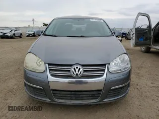 2006 Volkswagen Jetta z VIN 3VWDG71K66M748387, wystawiony jako Copart lot #55269553 z przebiegiem 141 937 mil mil oraz Czysty tytuł • Clean title. Historia ofert i sprzedaży dostępna na DreamBid. Obrazek 5.