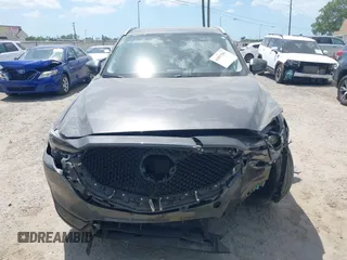 2017 Mazda CX-5 Grand Touring with VIN JM3KFADL3H0227655, listed as a IAAI auction lot 41897981 with 103,545 mi miles. Bid and sale history available at carsss.com. Image 12.