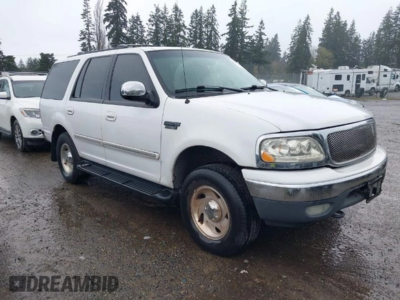 1999 Ford Expedition XLT z VIN 1FMPU18L5XLA15931, wystawiony jako IAAI lot #41952949 z przebiegiem 197 134 mil mil oraz . Historia ofert i sprzedaży dostępna na DreamBid. Obrazek 1.