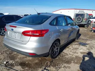 2017 Ford Focus SEL with VIN 1FADP3H24HL327179, listed as a IAAI auction lot 41607974 with 86,306 mi miles. Bid and sale history available at carsss.com. Image 4.