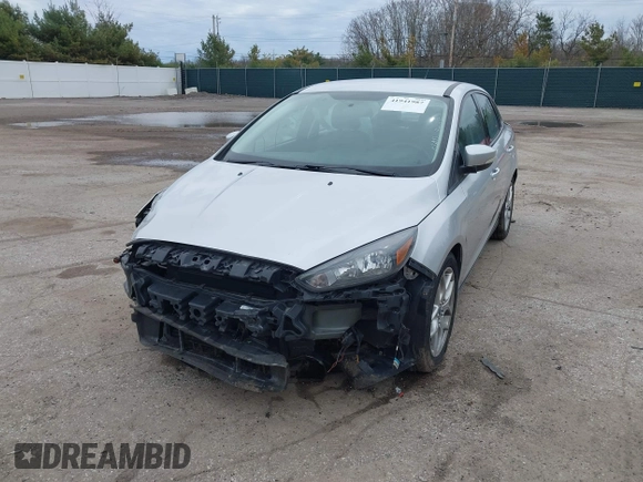 2015 Ford Focus SE with VIN 1FADP3F24FL347206, listed as a IAAI auction lot 41941987 with 96,473 mi miles and . Bid and sale history available at DreamBid. Image 2.