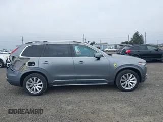 2016 Volvo XC90 T6 Momentum z VIN YV4A22PK7G1033452, wystawiony jako IAAI lot #41884004 z przebiegiem 78 734 mil mil oraz . Historia ofert i sprzedaży dostępna na DreamBid. Obrazek 14.