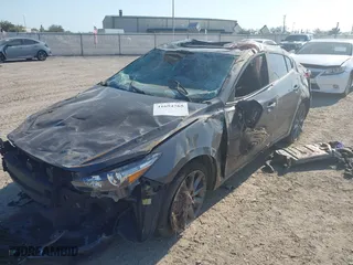 2018 Mazda Mazda3 4-Door Touring with VIN 3MZBN1V3XJM232331, listed as a IAAI auction lot 41694765 with 95556 miles. Bid and sale history available at carsss.com. Image 17.