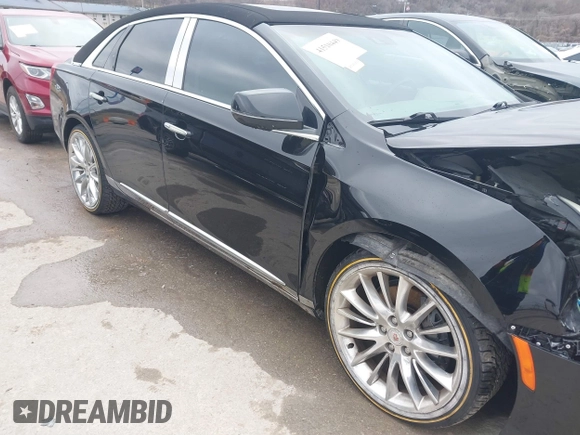 2013 Cadillac XTS Platinum z VIN 2G61V5S37D9194227, wystawiony jako IAAI lot #41510449 z przebiegiem 114 243 mil mil oraz . Historia ofert i sprzedaży dostępna na DreamBid. Obrazek 17.