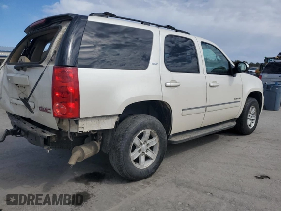 2012 GMC Yukon SLT with VIN 1GKS2CE05CR242879, listed as a Copart auction lot 50725855 with 162,506 mi miles and Salvage Title. Bid and sale history available at carsss.com. Image 3.