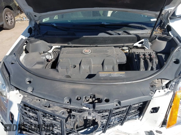 2013 Cadillac SRX Performance Collection with VIN 3GYFNDE37DS599557, listed as a IAAI auction lot 41633569 with 100,611 mi miles and . Bid and sale history available at DreamBid. Image 10.