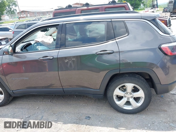 2019 Jeep Compass Latitude with VIN 3C4NJCBB1KT833007, listed as a IAAI auction lot 42401265 with 106,973 mi miles and . Bid and sale history available at DreamBid. Image 14.