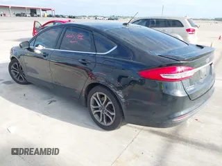 2017 Ford Fusion S with VIN 3FA6P0G75HR353909, listed as a IAAI auction lot 42024272 with 151,383 mi miles. Bid and sale history available at carsss.com. Image 3.