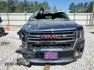 2023 GMC Yukon XL SLT with VIN 1GKS2GKDXPR254627, listed as a Copart auction lot 59226594 with 39,428 mi miles and Salvage Title. Bid and sale history available at DreamBid. Image 5.