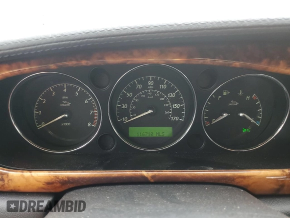 2006 Jaguar XJ Vanden Plas z VIN SAJWA82B46SG49807, wystawiony jako Copart lot #58930685 z przebiegiem 116 710 mil mil oraz Szkoda całkowita • Salvage title. Historia ofert i sprzedaży dostępna na DreamBid. Obrazek 9.