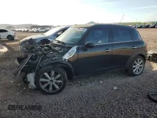 2011 MINI Countryman with VIN WMWZB3C58BWM00220, listed as a Copart auction lot 56655985 with 144,237 mi miles and Salvage title. Bid and sale history available at DreamBid. Image 1.