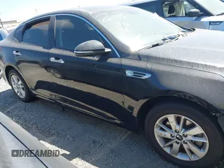 2017 Kia Optima LX z VIN KNAGT4L33H5156094, wystawiony jako IAAI lot #42405505 z przebiegiem 111 622 mil mil oraz . Historia ofert i sprzedaży dostępna na DreamBid. Obrazek 13.