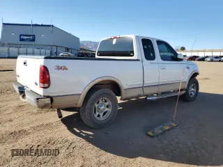 1998 Ford F-150 with VIN 1FTZX18W3WNA25682, listed as a Copart auction lot 47494755 with 197,389 mi miles and Salvage title. Bid and sale history available at DreamBid. Image 3.