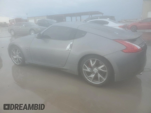 2015 Nissan 370Z Nismo z VIN JN1AZ4EH0FM444256, wystawiony jako Copart lot #54620065 z przebiegiem 78 626 mil mil oraz Szkoda całkowita • Salvage title. Historia ofert i sprzedaży dostępna na DreamBid. Obrazek 2.