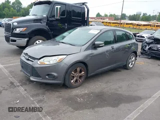 2014 Ford Focus SE with VIN 1FADP3K20EL104271, listed as a IAAI auction lot 39596262 with 81,021 mi miles. Bid and sale history available at carsss.com. Image 2.