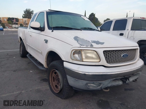 1999 Ford F-150 XL with VIN 1FTRX18L1XKB61205, listed as a IAAI auction lot 40991236 with 178,889 mi miles. Bid and sale history available at carsss.com. Image 1.