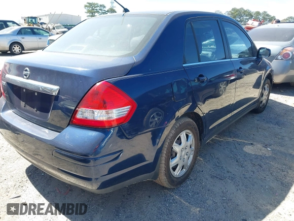2009 Nissan Versa 1.8 S with VIN 3N1BC11E39L378963, listed as a IAAI auction lot 41829690 with 169,531 mi miles. Bid and sale history available at carsss.com. Image 4.