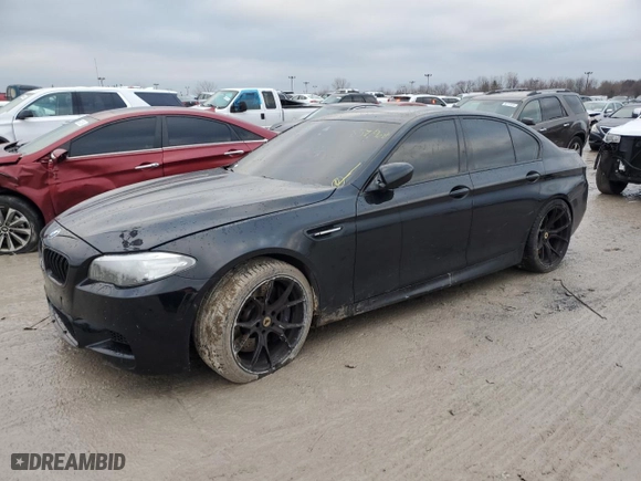 2014 BMW M5 with VIN WBSFV9C59ED097862, listed as a Copart auction lot 85719684 with 0 mi miles and Salvage Title. Bid and sale history available at carsss.com. Image 1.