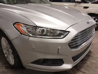 2015 Ford Fusion SE Hybrid with VIN 3FA6P0LU7FR266702, listed as a IAAI auction lot 41390791 with 94,465 mi miles. Bid and sale history available at carsss.com. Image 6.