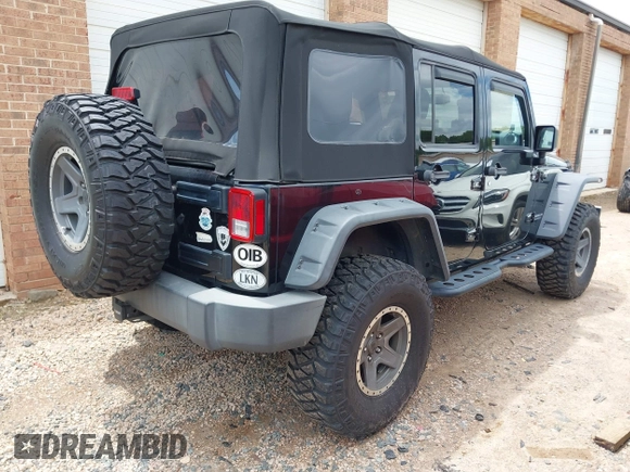 2015 Jeep Wrangler Unlimited Rubicon with VIN 1C4BJWFG4FL566862, listed as a IAAI auction lot 42310901 with 146,206 mi miles and . Bid and sale history available at DreamBid. Image 4.