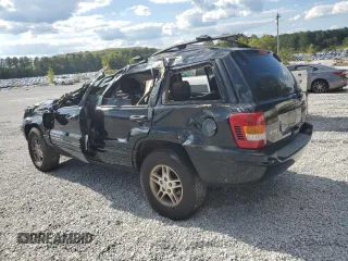 2000 Jeep Grand Cherokee Laredo with VIN 1J4G258S5YC193875, listed as a Copart auction lot 74731704 with Not provided miles and Salvage title. Bid and sale history available at DreamBid. Image 2.