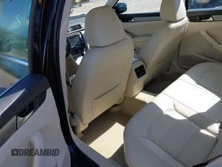 2014 Volkswagen Passat SE с VIN 1VWBN7A37EC002696, выставлен на аукционе IAAI как лот 42308028 с пробегом 165 111 миль миль и . История ставок и продаж доступна на DreamBid. Изображение 8.