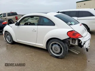 2013 Volkswagen Beetle 2.5L w/Sun/Sound/Nav with VIN 3VWJX7ATXDM610778, listed as a Copart auction lot 55654045 with Not Provided miles and Salvage Title. Bid and sale history available at DreamBid. Image 2.