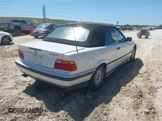 1995 BMW 3 Series 325iC with VIN WBABJ632XSJD40243, listed as a IAAI auction lot 41838410 with 199,909 mi miles. Bid and sale history available at carsss.com. Image 4.