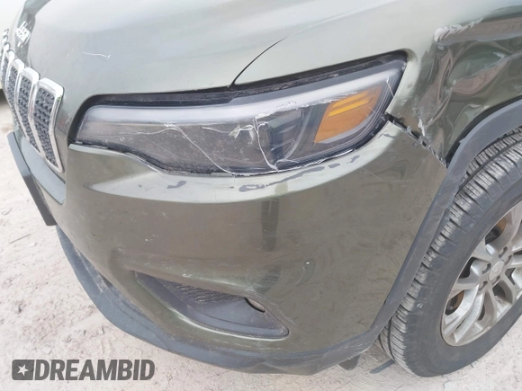 2019 Jeep Cherokee Latitude Plus with VIN 1C4PJMLB2KD395617, listed as a IAAI auction lot 41992532 with 254,632 mi miles and . Bid and sale history available at carsss.com. Image 6.